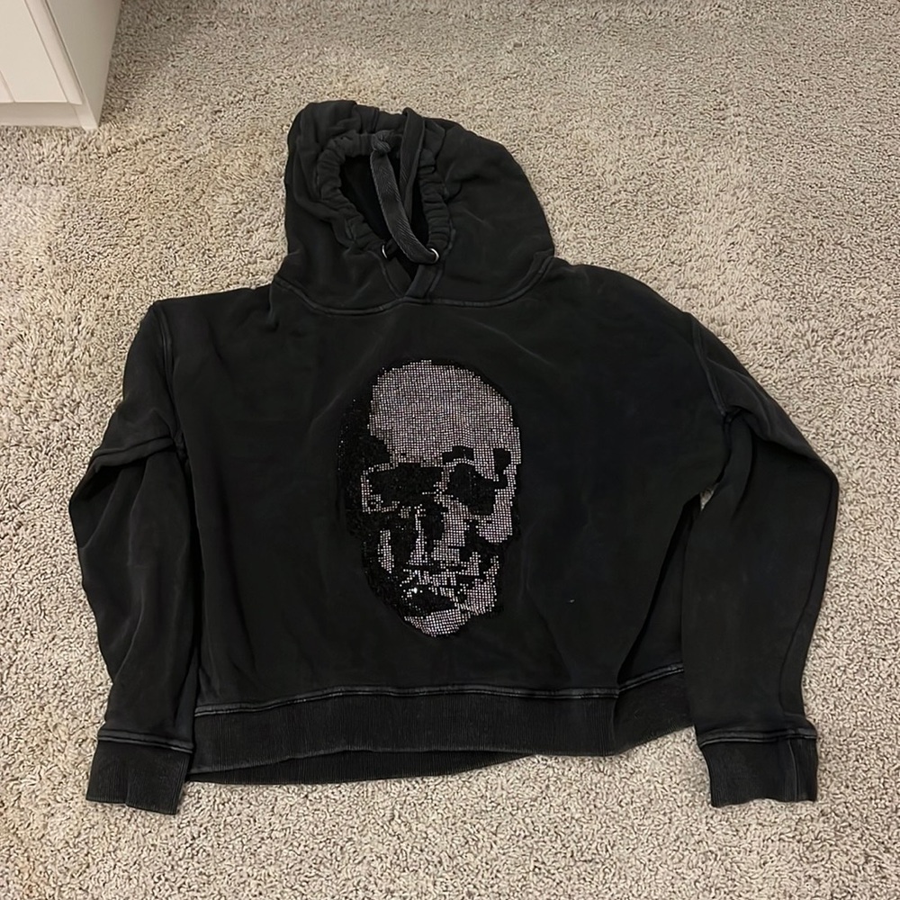 Super trendy bedazzled skull hoodie! Gently worn but in great condition!